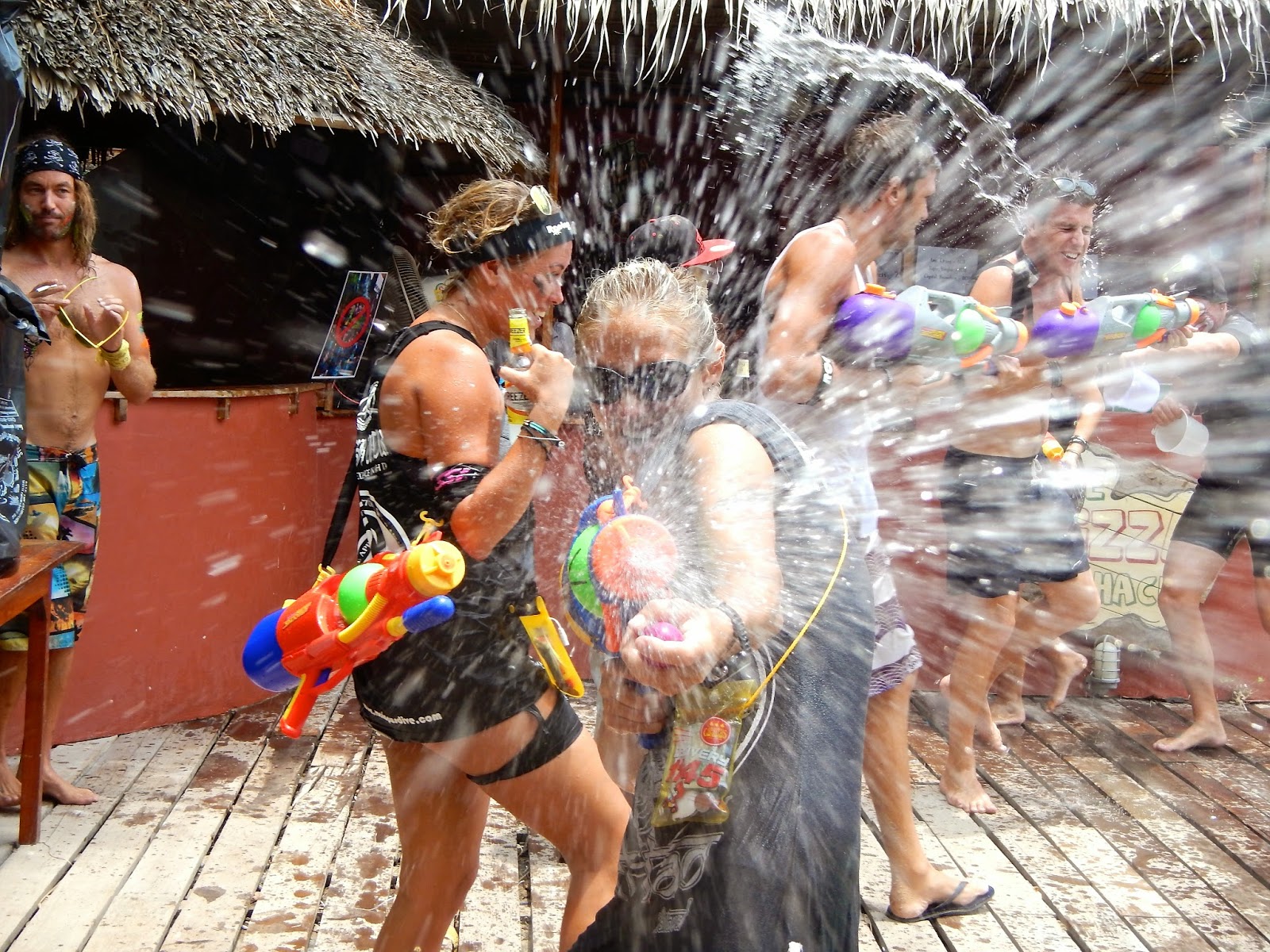 Shawna spraying me with a water gun during Songkran
