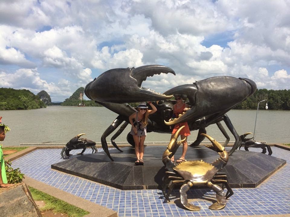 Checking out a giant grab statue in Krabi, Thailand