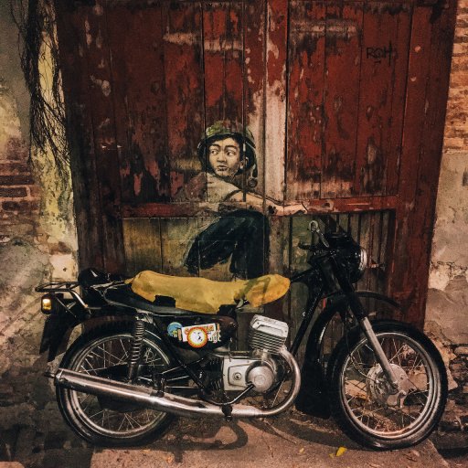 'Boy on Motorcycle' street art installation by Ernest Zacharevic