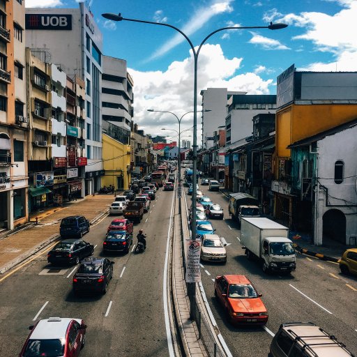 View of the busy city street from the pedestrian overpass in Pudu.