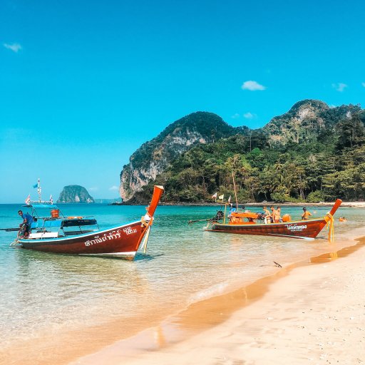 Longtail boats on Charlie Beach